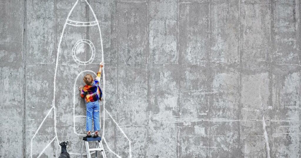 Koje mi kompetencije trebaju? Little boy drawing a huge rocket on the wall.